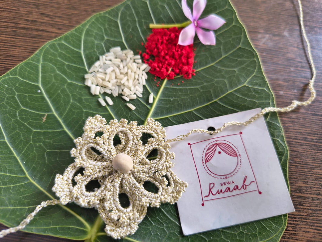 White golden fine crochet rakhi